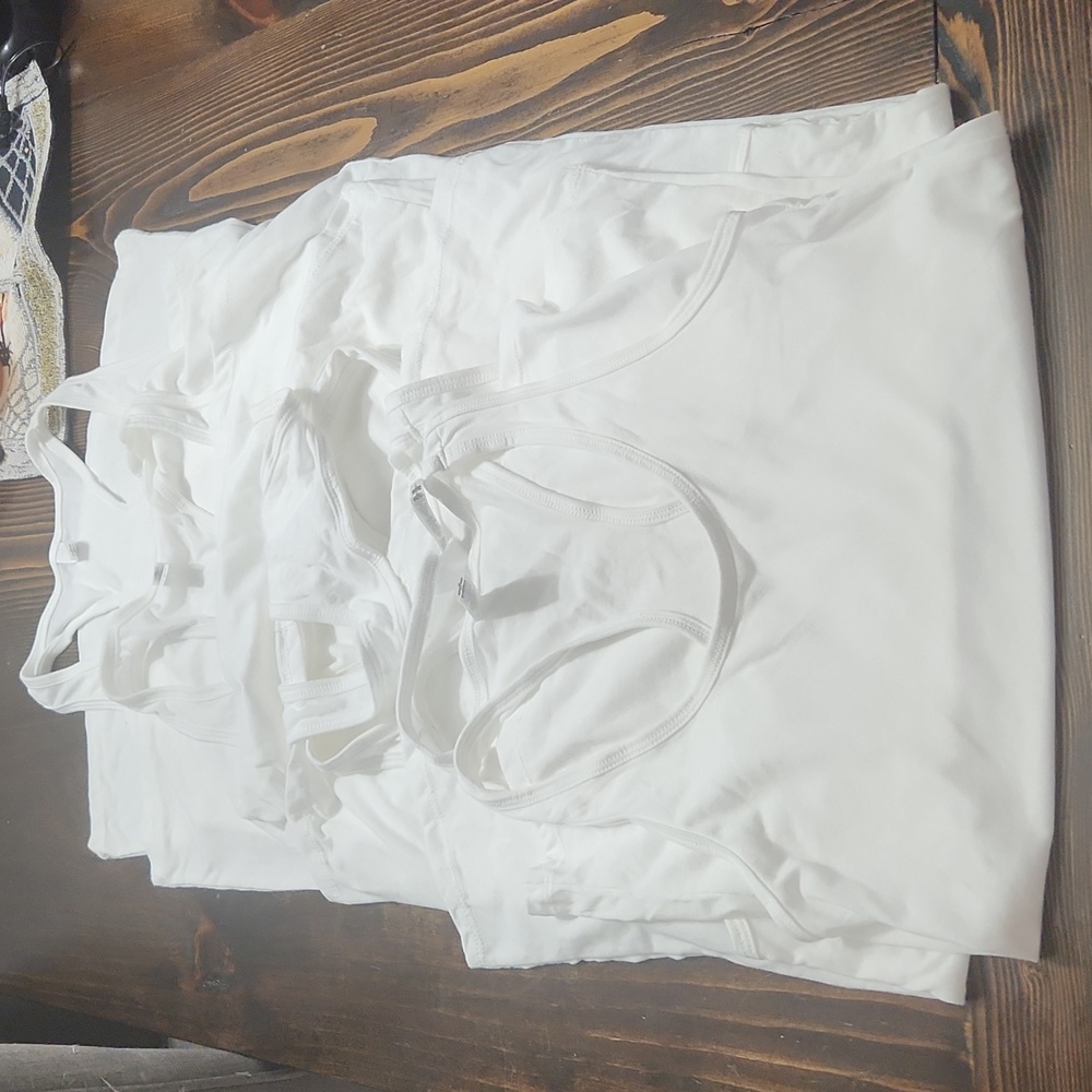 $12 For 6 New Razor Back Tank Tops